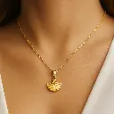 gold leaf pendent women necklace on neck